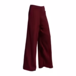 Ladies wide leg trousers in burgundy polyester crepe, three-quarter ghost form angle showing the flat waistband, slanted pocket and the full fall of the wide legs