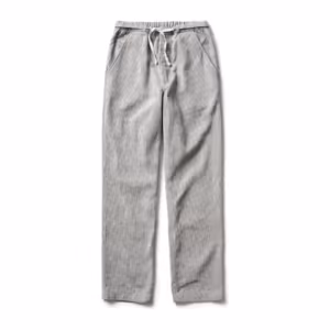 Chef trousers in a small light grey and white woven check, full front view with part-elastic drawstring waist, slanted side pockets and a loose straight leg