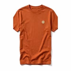 Men's custom made t-shirt in terracotta cotton jersey, full front view with ribbed crew neck and a small cream embroidered emblem on the left chest