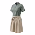 Sage green housekeeping tunic with a stone waist apron tied at the front, three-quarter angle view showing the zip front, chest pocket and the apron