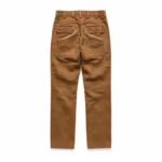 Men's hunting trousers in brown heavy cotton canvas, back view with yoke, two buttoned flap back pockets and a reinforced seat panel