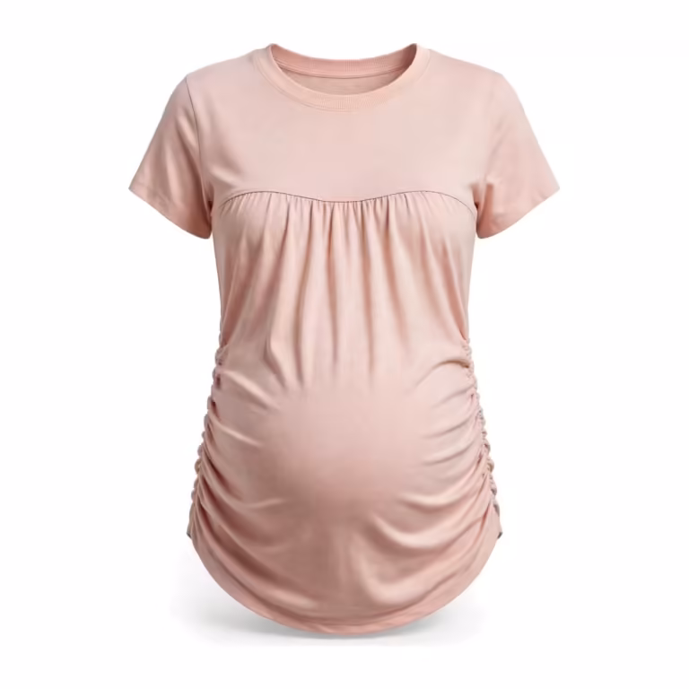 Ladies maternity t-shirt in soft pink cotton jersey, full front view with ribbed crew neck, empire seam under the bust, gathered front panel and ruched side seams over the bump