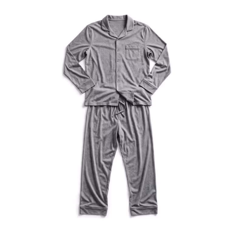 Men's grey marl two-piece pyjama set in cotton jersey, full front view laid as one outfit: a long-sleeve top with a notched collar, button front with matte buttons and a chest pocket, over matching full-length pants with a drawstring waist