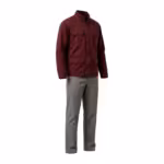 Burgundy cotton twill work jacket with zip front, stand collar and four flap pockets over grey flat-front work trousers, three-quarter angle view of the coordinated own-label workwear set